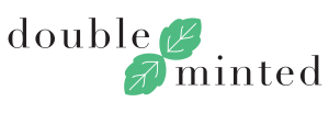 double minted logo with two mint leaves between the words